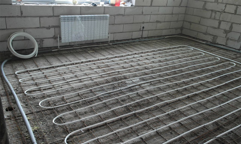 Installation of a heating system and water floor heating