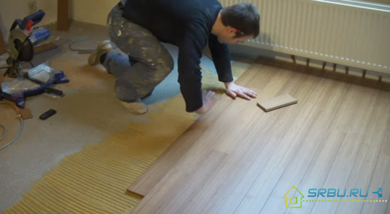 Parquet board and its laying
